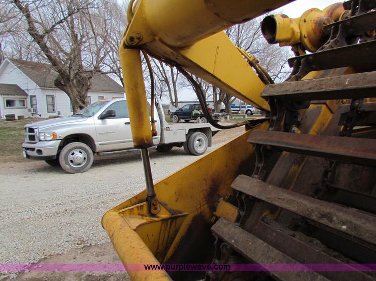 image for item B7064 John Deere 762 scraper