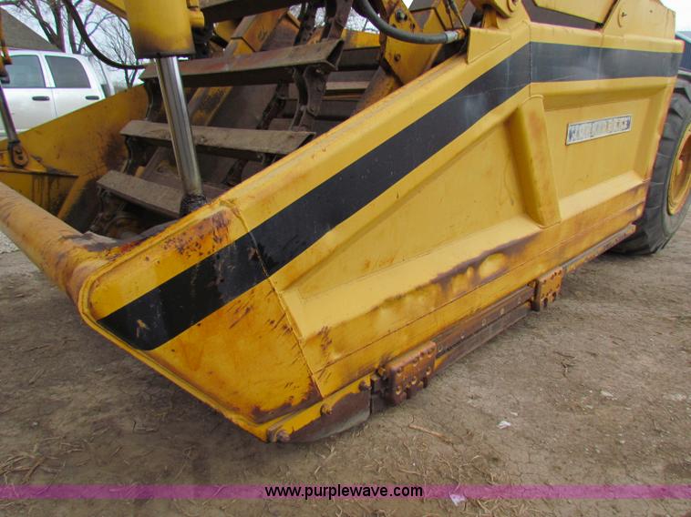image for item B7064 John Deere 762 scraper