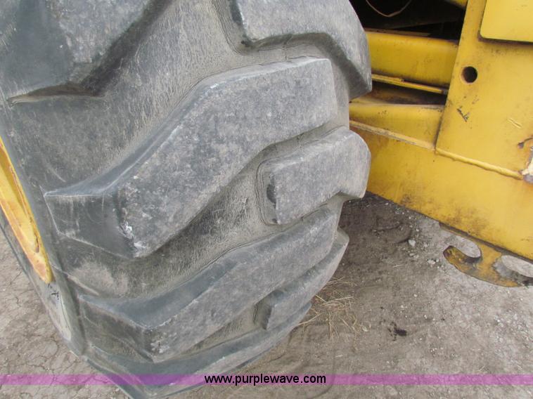 image for item B7064 John Deere 762 scraper