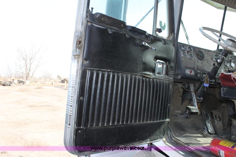 image for item B8877 1977 Kenworth tandem axle dump truck