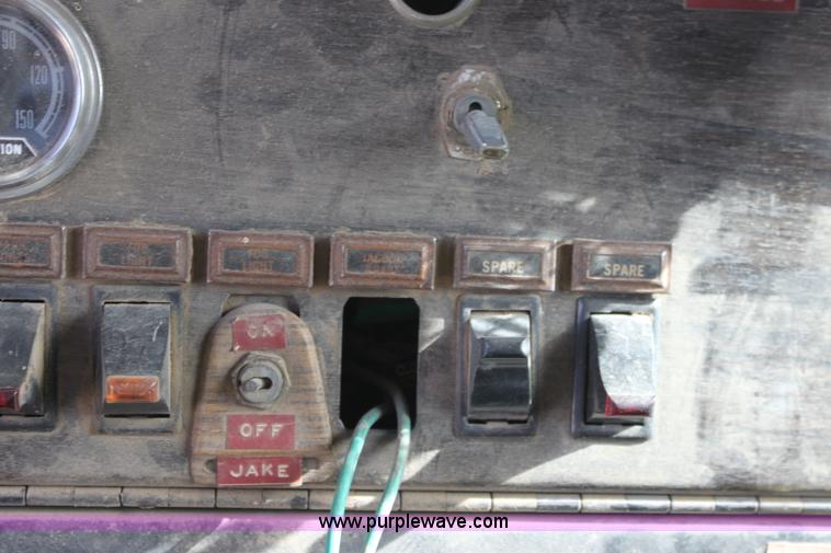 image for item B8877 1977 Kenworth tandem axle dump truck