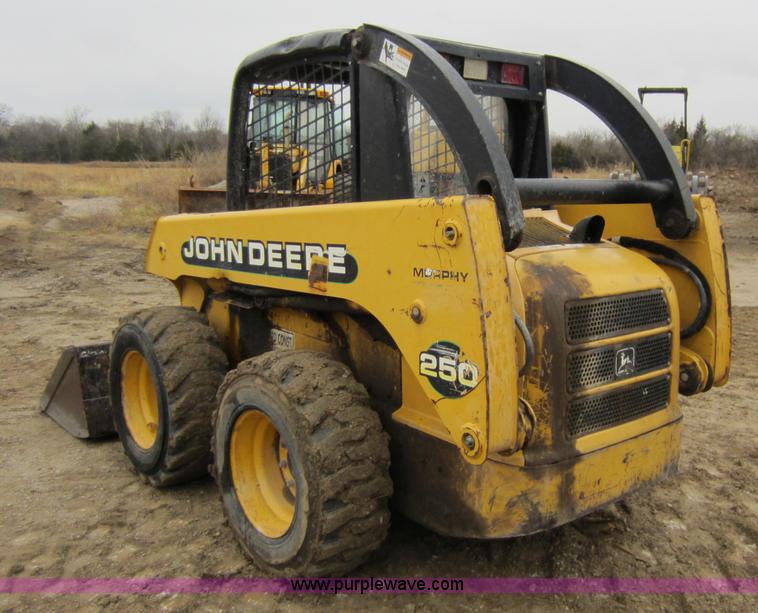 image for item C5271 1999 John Deere 250 skid steer