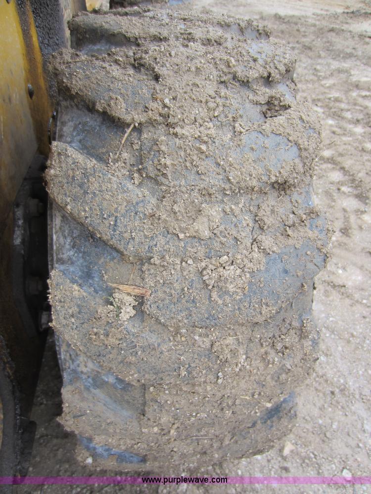 image for item C5271 1999 John Deere 250 skid steer