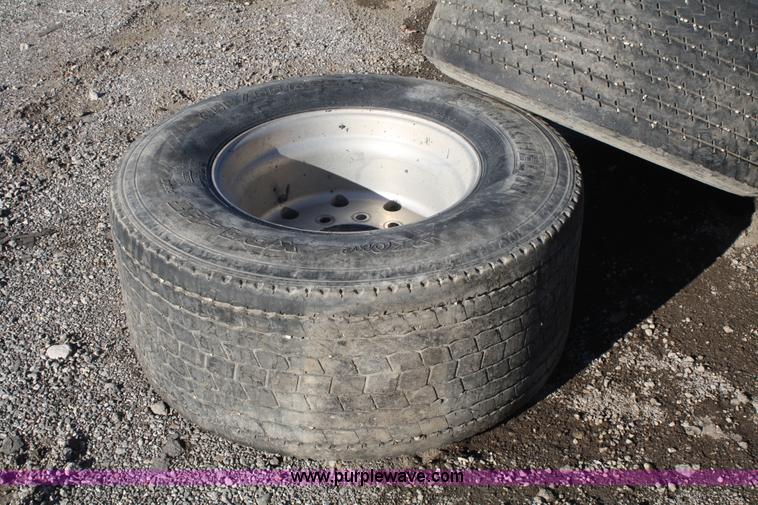 image for item H9544 (4) 455/55R22.5 tires and aluminum wheels