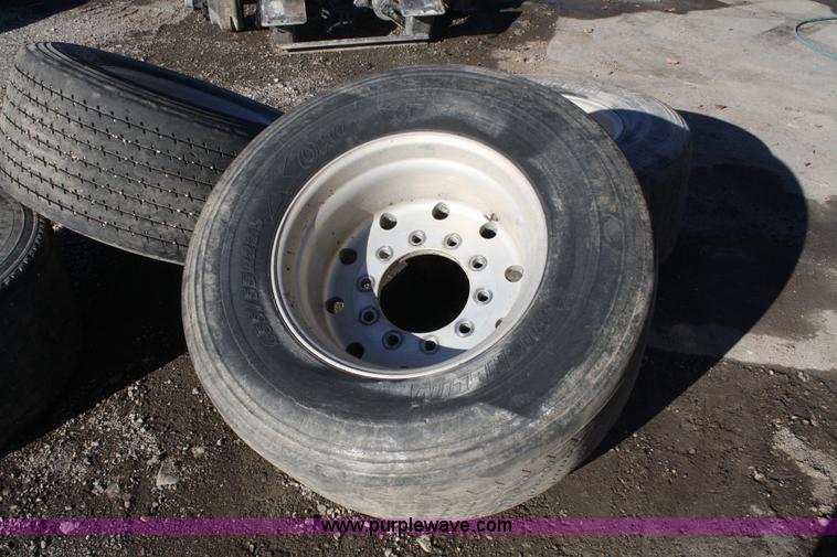 image for item H9544 (4) 455/55R22.5 tires and aluminum wheels