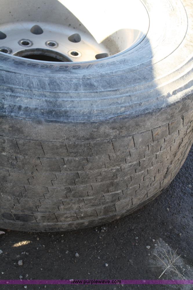 image for item H9544 (4) 455/55R22.5 tires and aluminum wheels
