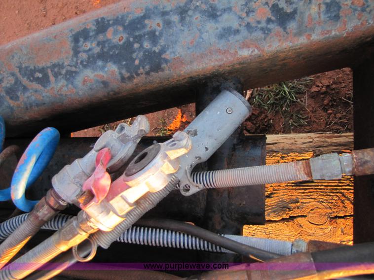 image for item B2200 A-frame shop built expandable combine trailer