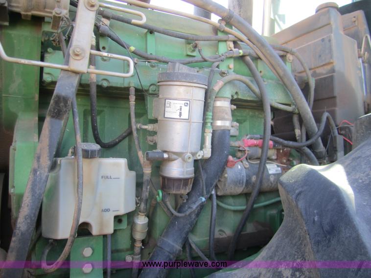 image for item B5614 2001 John Deere 9400 4WD tractor