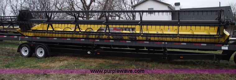 image for item C5957 2004 New Holland 74C 30' flex head