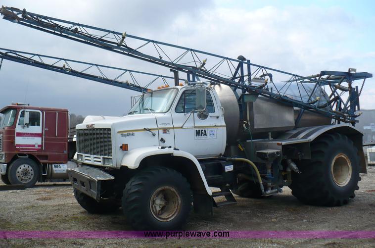 image for item C5974 1984 GMC Topkick 7000 sprayer truck