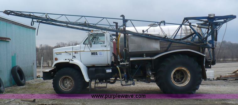 image for item C5974 1984 GMC Topkick 7000 sprayer truck