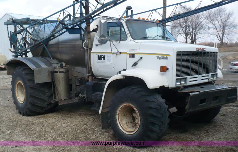 image for item C5974 1984 GMC Topkick 7000 sprayer truck