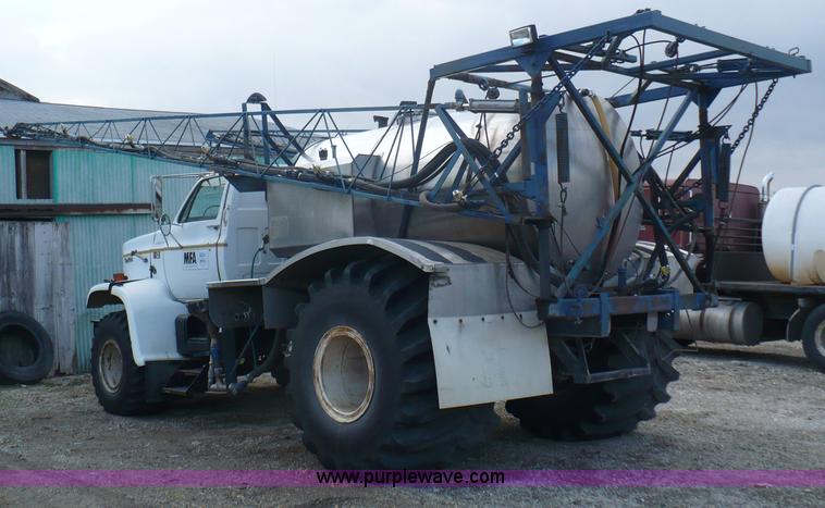 image for item C5974 1984 GMC Topkick 7000 sprayer truck