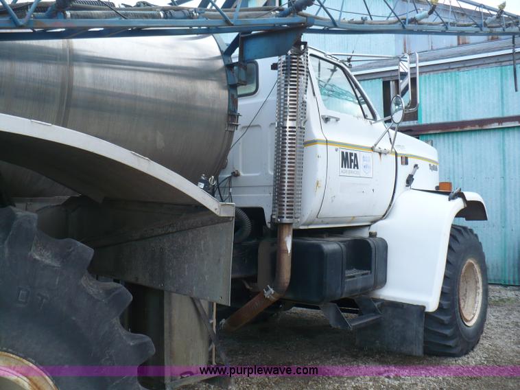 image for item C5974 1984 GMC Topkick 7000 sprayer truck