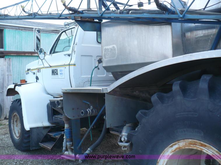 image for item C5974 1984 GMC Topkick 7000 sprayer truck