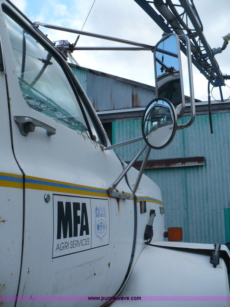 image for item C5974 1984 GMC Topkick 7000 sprayer truck