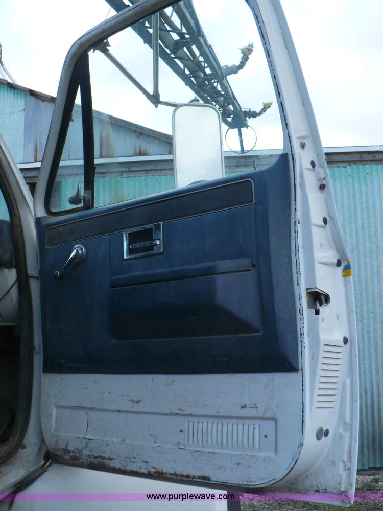 image for item C5974 1984 GMC Topkick 7000 sprayer truck