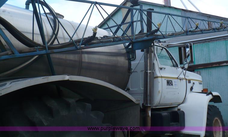 image for item C5974 1984 GMC Topkick 7000 sprayer truck