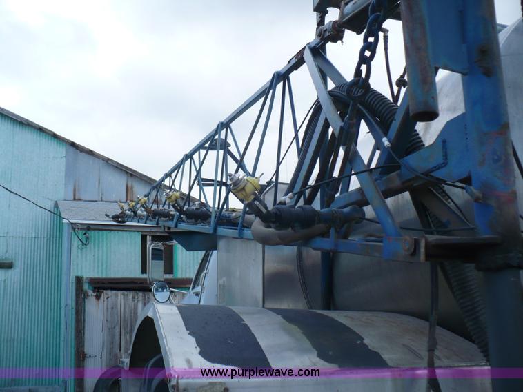 image for item C5974 1984 GMC Topkick 7000 sprayer truck