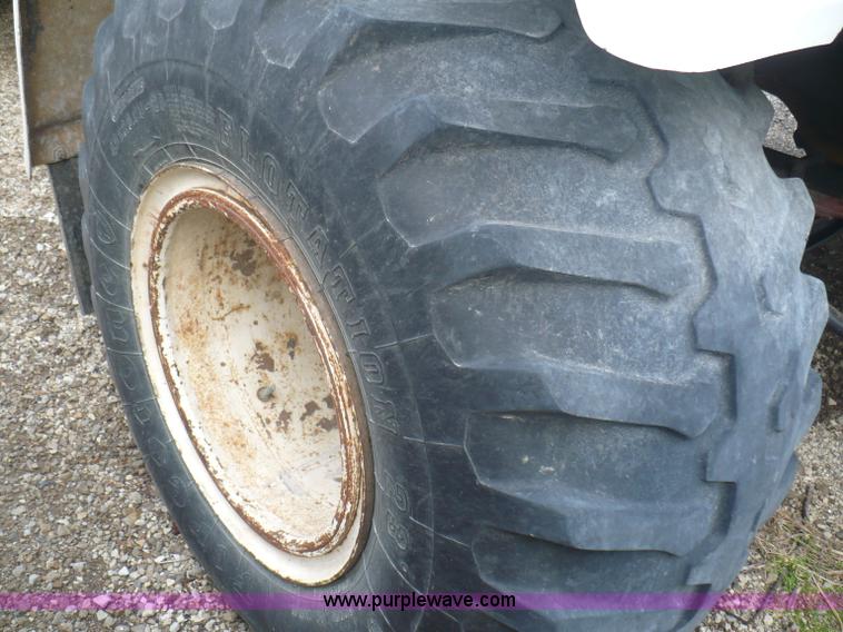 image for item C5974 1984 GMC Topkick 7000 sprayer truck