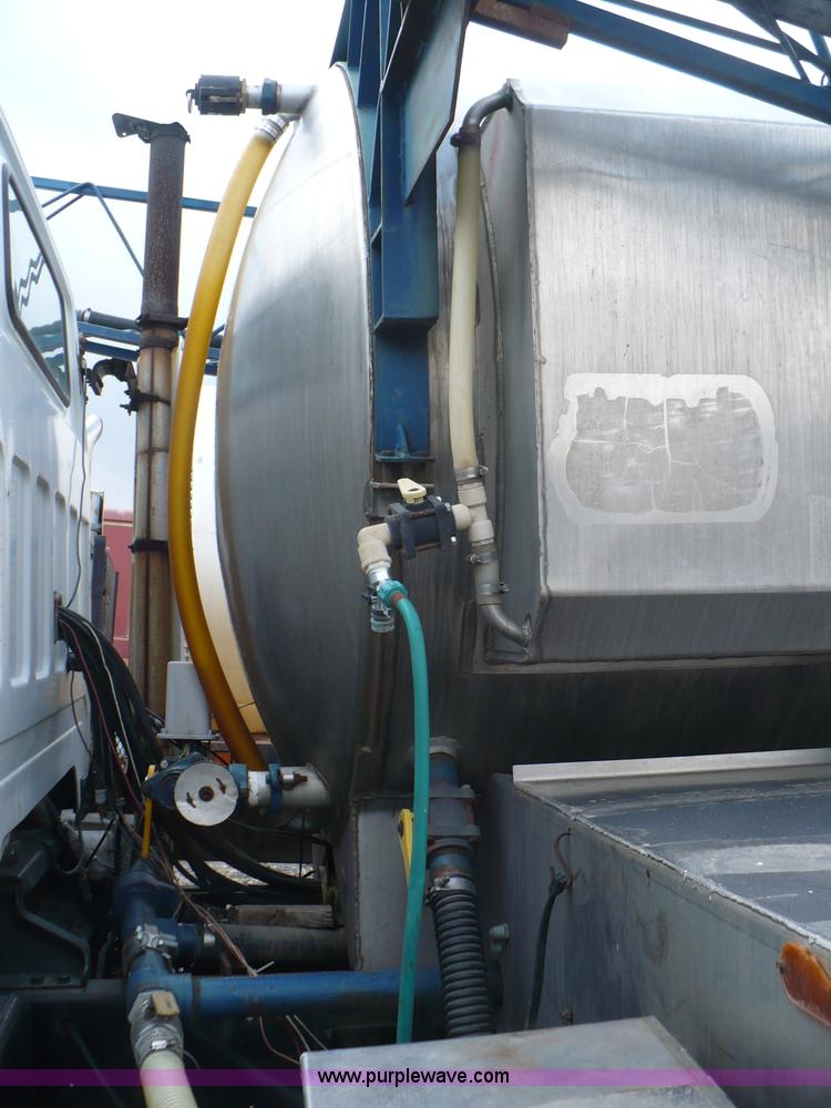 image for item C5974 1984 GMC Topkick 7000 sprayer truck