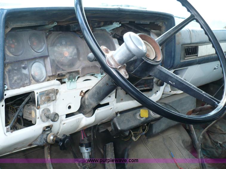 image for item C5974 1984 GMC Topkick 7000 sprayer truck