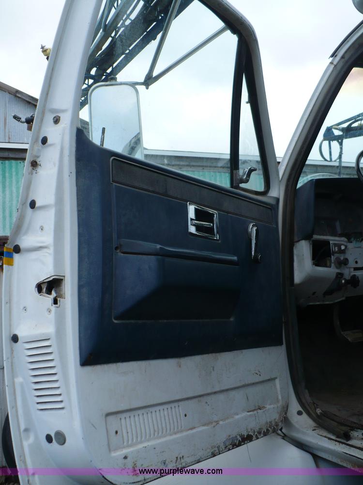 image for item C5974 1984 GMC Topkick 7000 sprayer truck