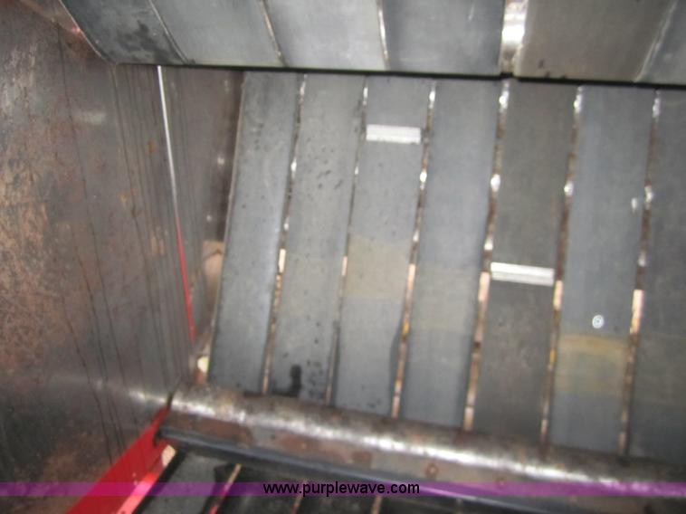 image for item C9902 New Holland BR780A round baler