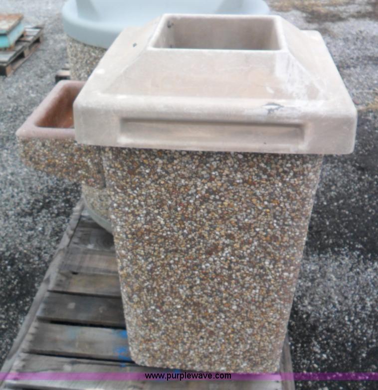 image for item A1946 (2) cast concrete trash cans