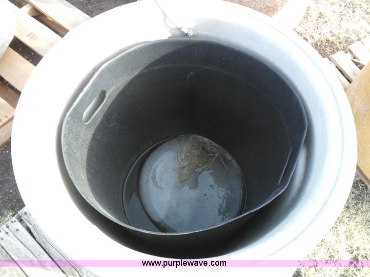 image for item A1946 (2) cast concrete trash cans