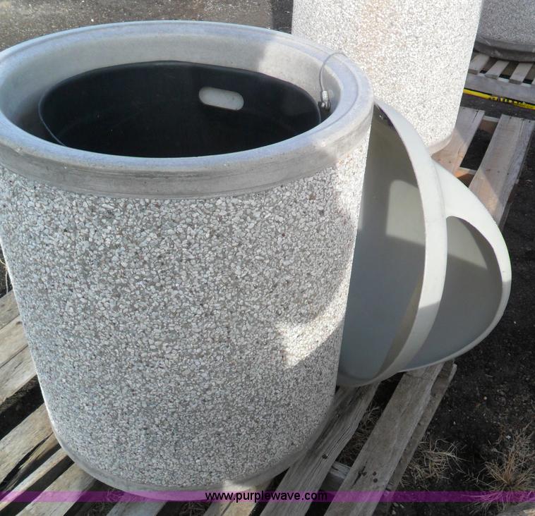 image for item A1946 (2) cast concrete trash cans