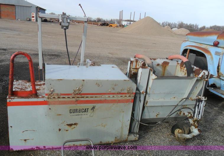 image for item A1954 Curb Cat curb forming machine