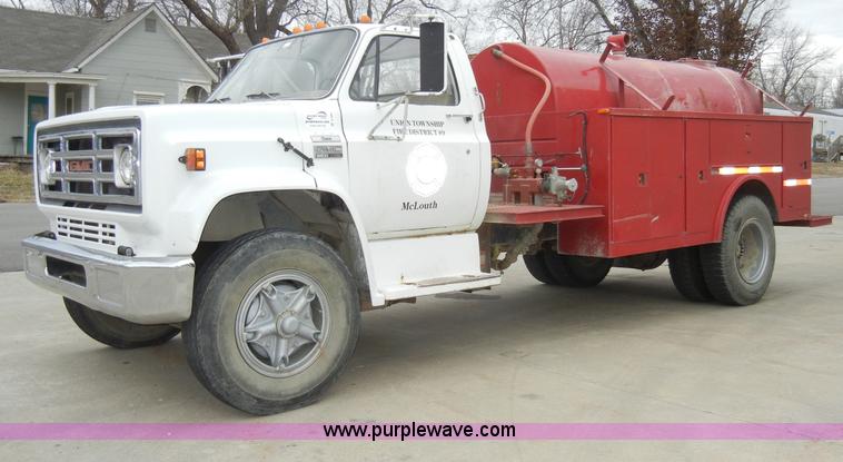 image for item A3465 1977 GMC Sierra 6500 water tanker