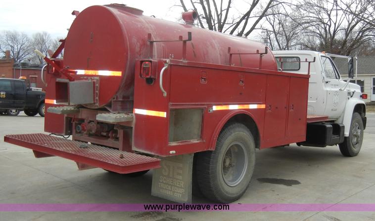 image for item A3465 1977 GMC Sierra 6500 water tanker