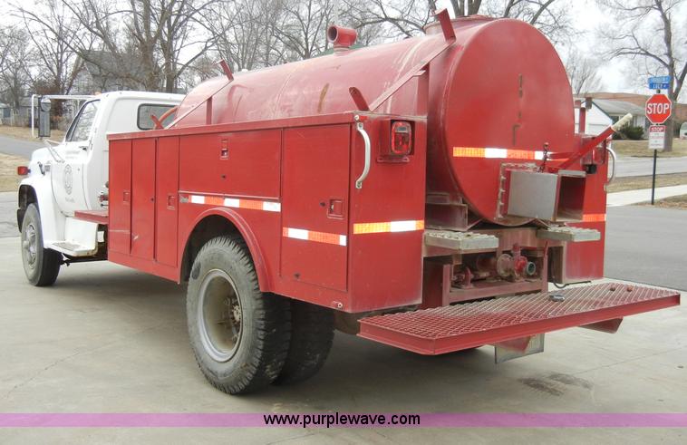 image for item A3465 1977 GMC Sierra 6500 water tanker