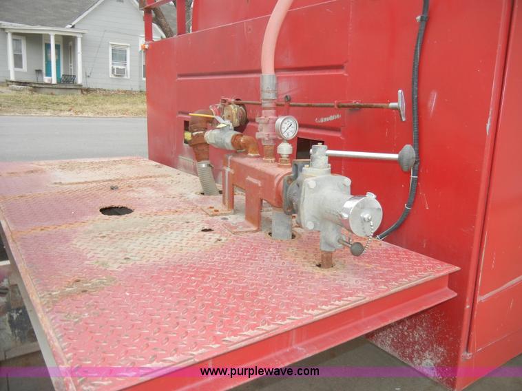 image for item A3465 1977 GMC Sierra 6500 water tanker