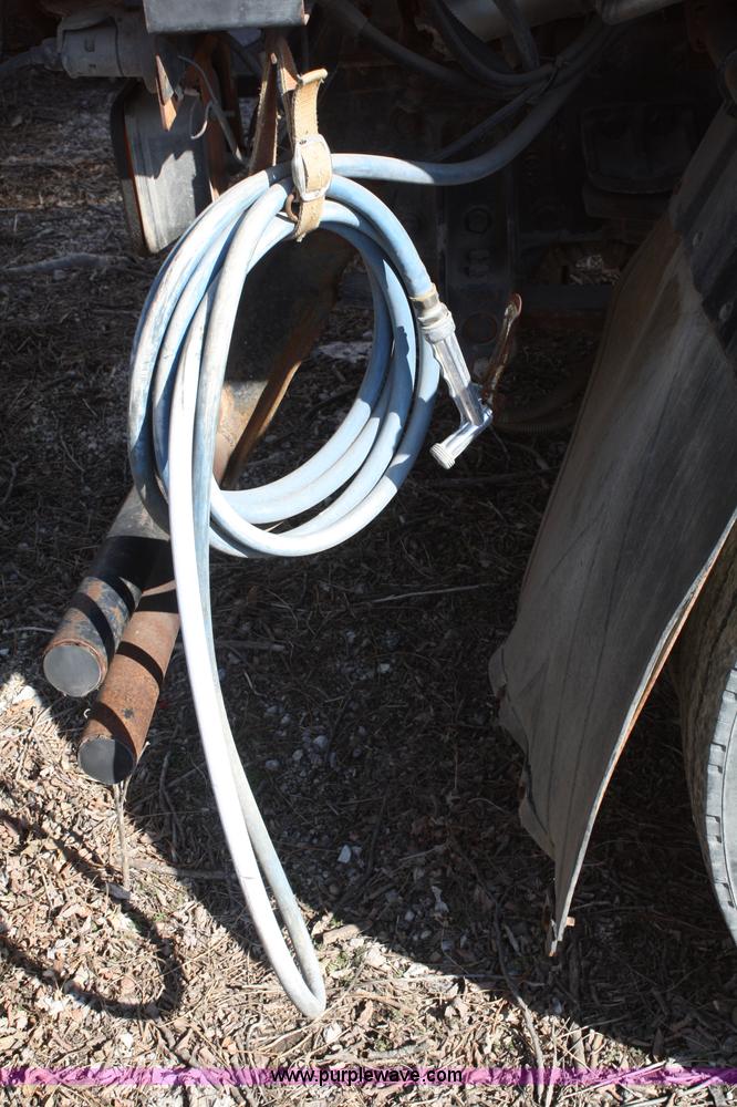 image for item A6963 1992 GMC W7000 street sweeper