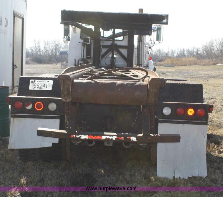 image for item A6977 1995 Mack DM688S roll off truck