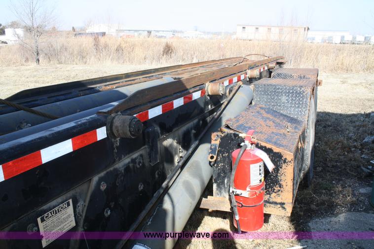 image for item A6977 1995 Mack DM688S roll off truck