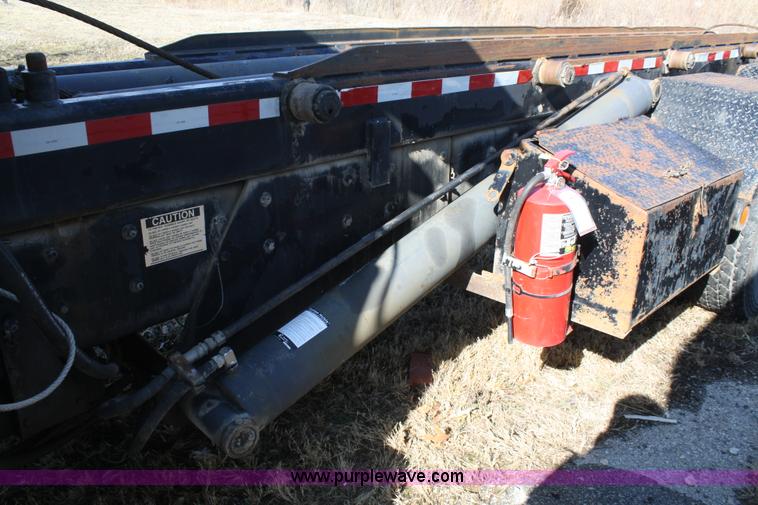 image for item A6977 1995 Mack DM688S roll off truck