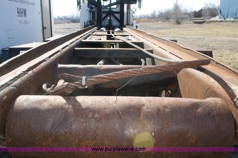 image for item A6977 1995 Mack DM688S roll off truck