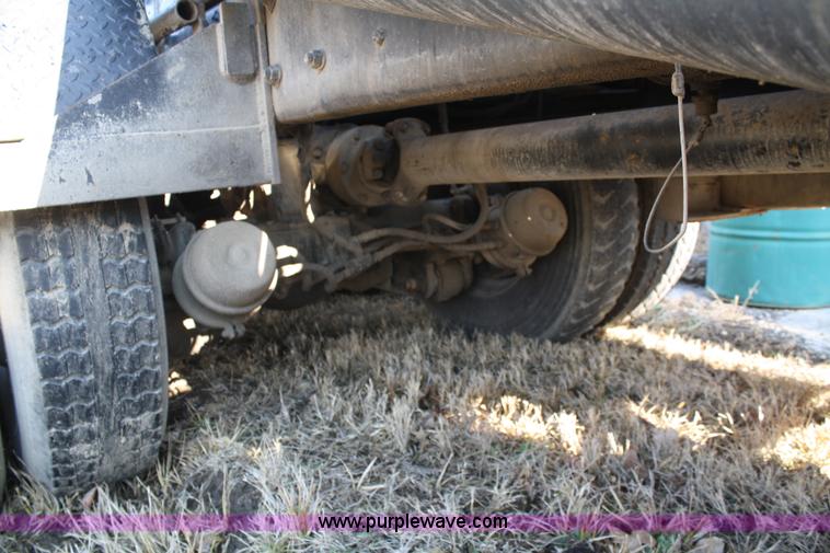 image for item A6977 1995 Mack DM688S roll off truck