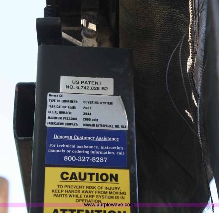 image for item A6977 1995 Mack DM688S roll off truck