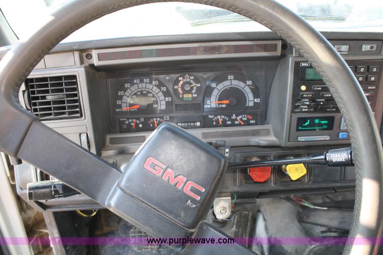 image for item A6986 2000 GMC C8500 flatbed truck