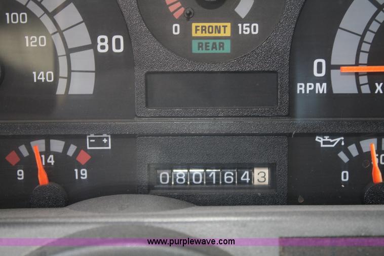 image for item A6986 2000 GMC C8500 flatbed truck