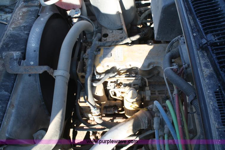 image for item A6986 2000 GMC C8500 flatbed truck