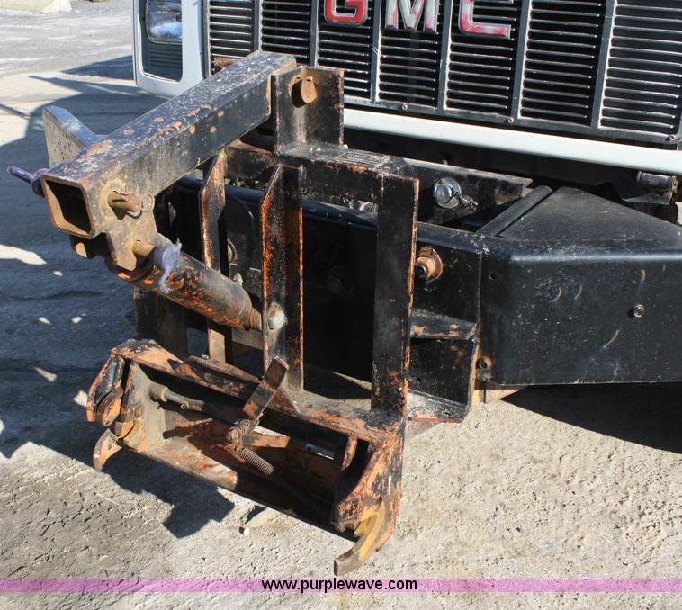 image for item A6986 2000 GMC C8500 flatbed truck