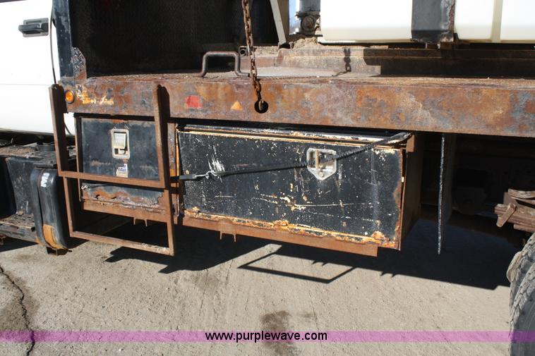 image for item A6986 2000 GMC C8500 flatbed truck