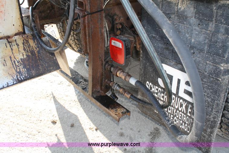 image for item A6986 2000 GMC C8500 flatbed truck