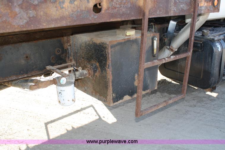 image for item A6986 2000 GMC C8500 flatbed truck